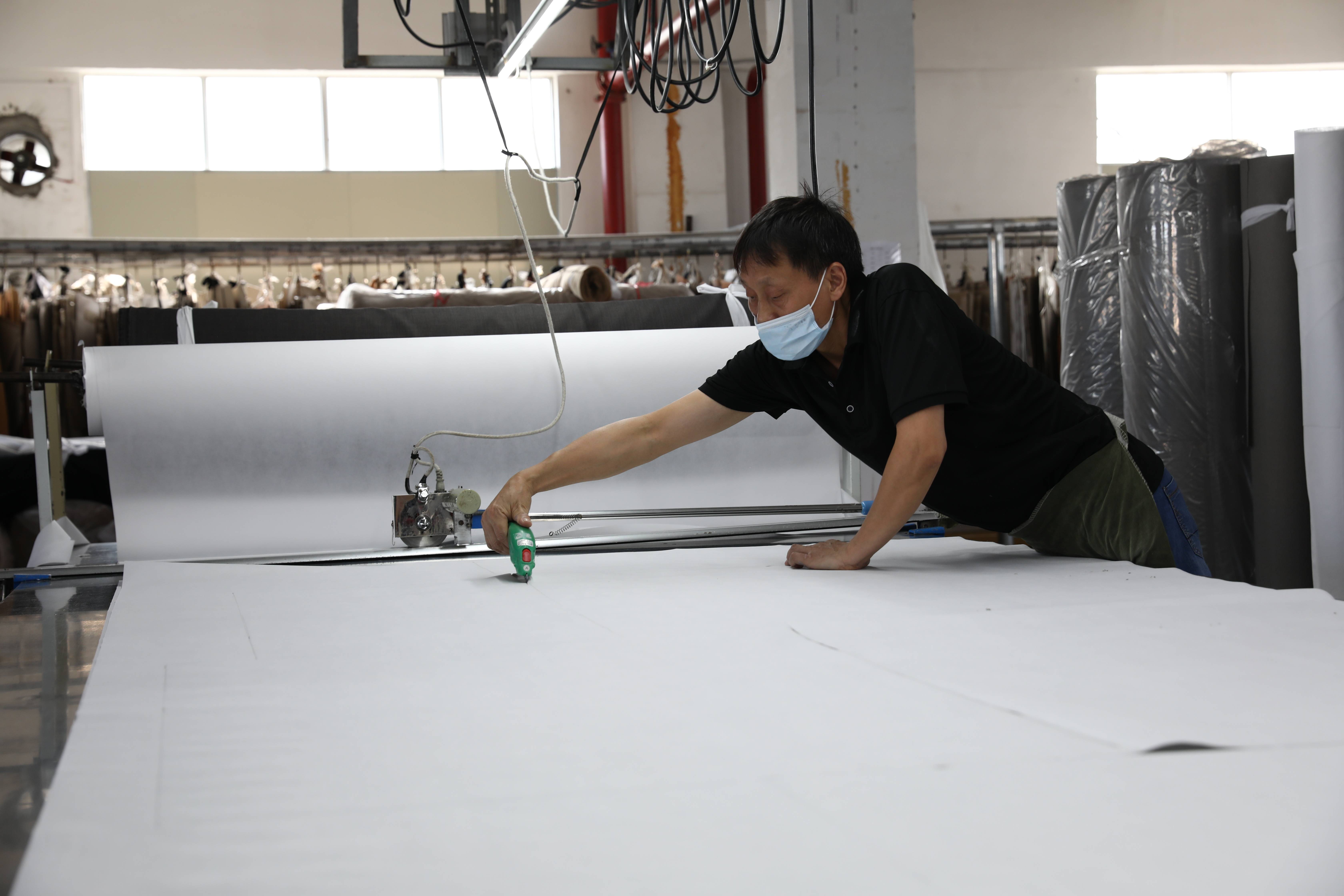 couch fabric cutting while in sofa production