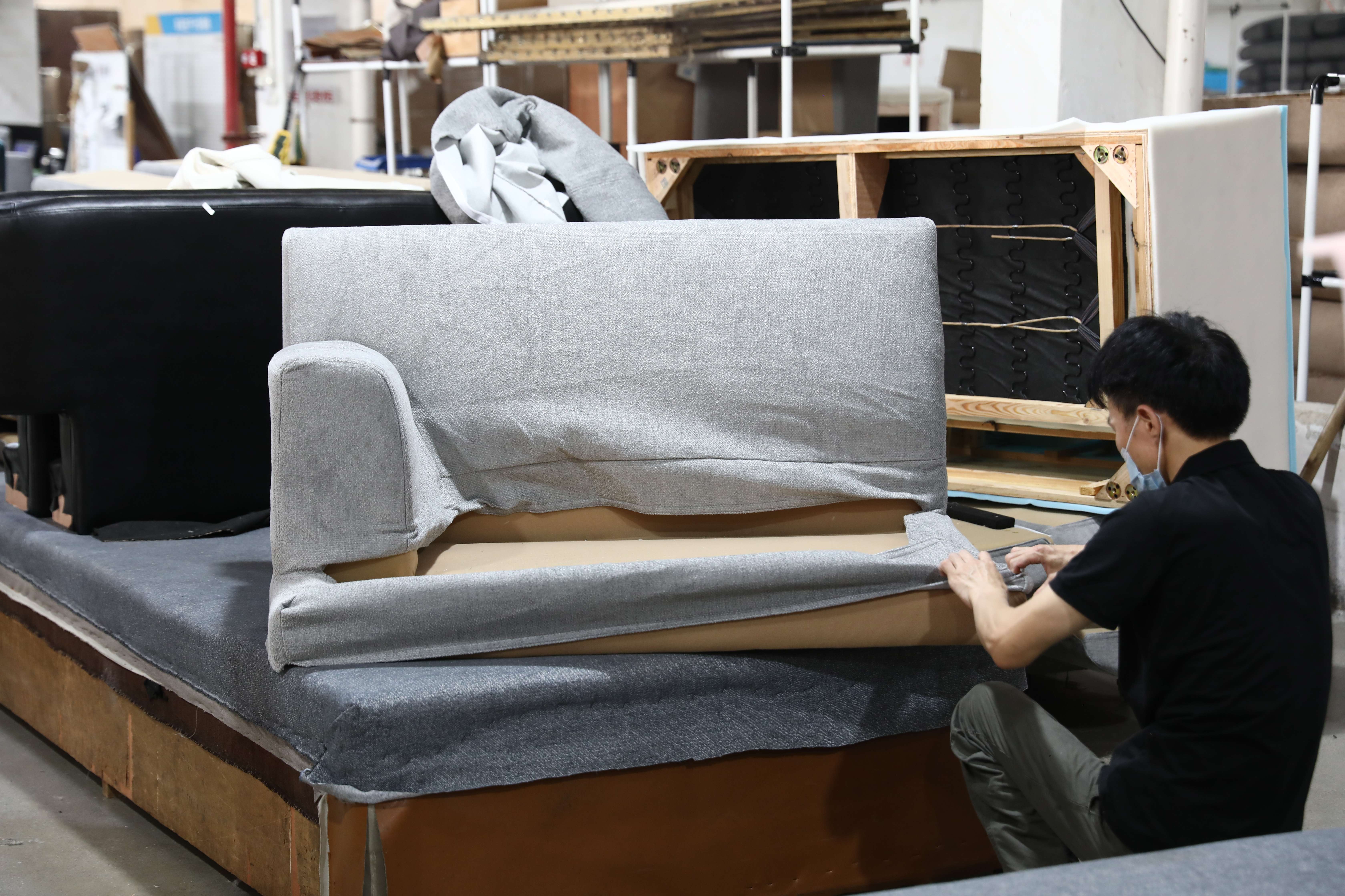 attaching and upholstered while in sofa production